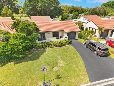 This Boca Lago Villa is completely renovated in every way and