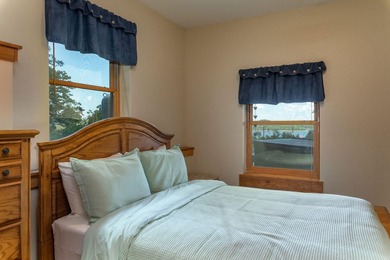 Set on 2.5 acres along the shoreline, this lakefront estate - photo 50
