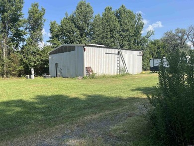 Country living with commercial potential on 3 acres. This gated - photo 1