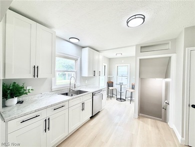 Welcome home to this fully remodeled, move-in-ready Cape Cod - photo 9