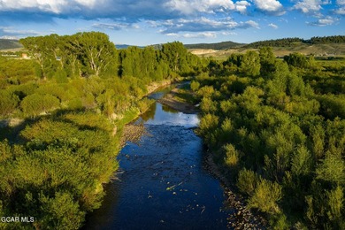 Fraser River Ranch is a rare 176-acre live-water ranch featuring - photo 3