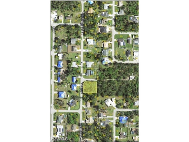 Positioned on an oversized spacious corner lot in a - photo 2