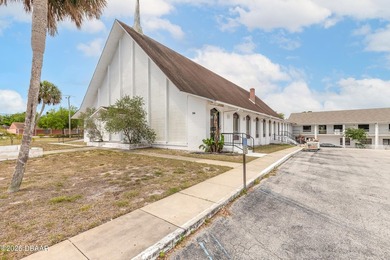 Situated just one block from Granada Blvd. and two blocks from - photo 1