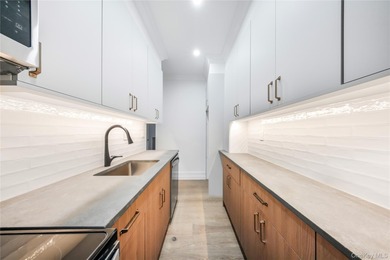 This is Unit 5B at the Savoy Court in Astoria, a fully remodeled - photo 12