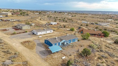 This charming 4-bedroom, 2-bath double wide offers stunning - photo 7