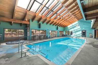 Discover mountain living in this inviting condo nestled near the - photo 1