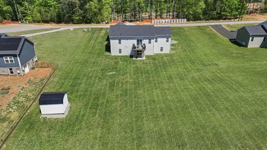 Well designed contemporary ranch built in 2025 features an - photo 2