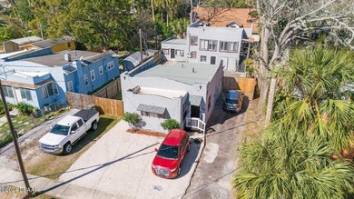 TURNKEY TRIPLEX INVESTMENT WITH STRONG INCOME POTENTIAL! Check - photo 1