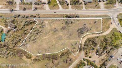 Set on 5 pristine acres in Jackson Hole, WY 83001 this - photo 9