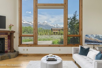 Tucked in the shadow of the majestic Tetons, this stunning home - photo 1