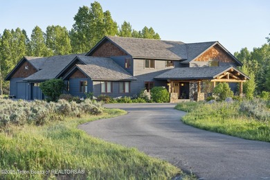 Tucked in the shadow of the majestic Tetons, this stunning home - photo 3