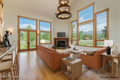 Tucked in the shadow of the majestic Tetons, this stunning home - photo 4