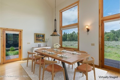 Tucked in the shadow of the majestic Tetons, this stunning home - photo 7