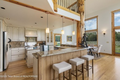 Tucked in the shadow of the majestic Tetons, this stunning home - photo 8