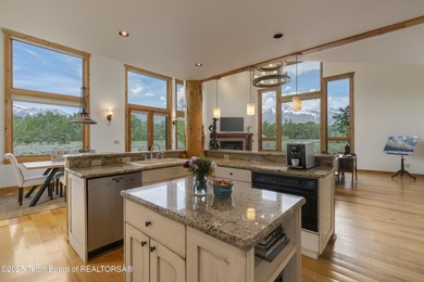 Tucked in the shadow of the majestic Tetons, this stunning home - photo 9