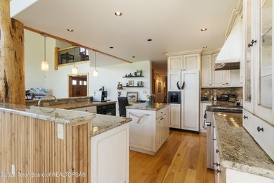 Tucked in the shadow of the majestic Tetons, this stunning home - photo 10