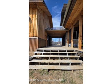 Completed in 2023, the home reflects a thoughtful balance of - photo 3