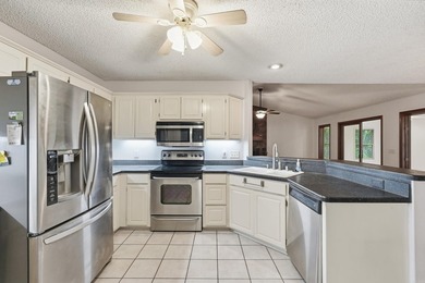 Tucked away at the end of a quiet cul-de-sac, this home includes - photo 7