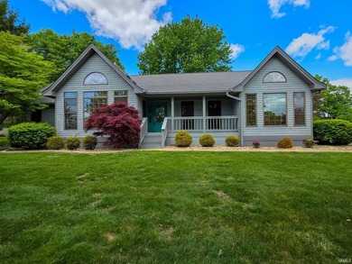 Situated on a picturesque 1.59-acre mostly level lot with a - photo 2