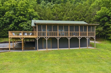 Welcome to this beautifully renovated log home tucked away in a - photo 2