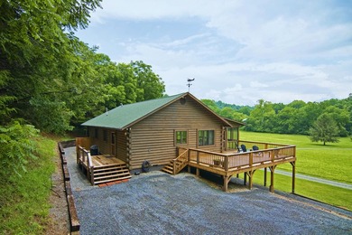 Welcome to this beautifully renovated log home tucked away in a - photo 6