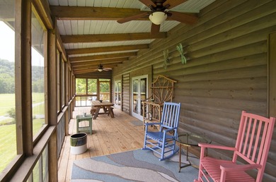 Welcome to this beautifully renovated log home tucked away in a - photo 10