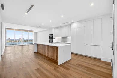 Indulge in the elegance of resort-style waterfront living in - photo 3