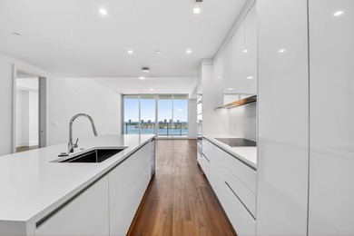 Indulge in the elegance of resort-style waterfront living in - photo 5