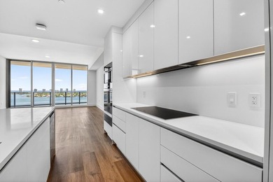 Indulge in the elegance of resort-style waterfront living in - photo 6