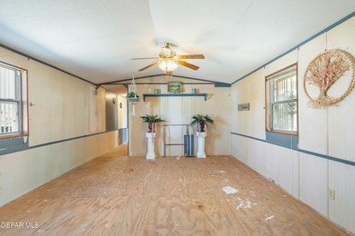 LAND + MANUFACTURED HOME in Northeast El Paso! This property