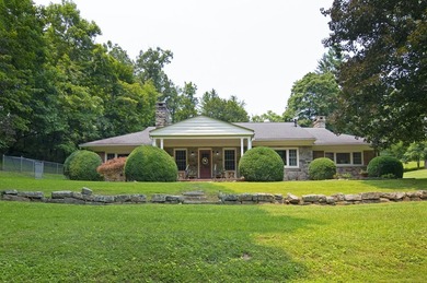 Welcome to this beautifully renovated one-level home, situated - photo 2