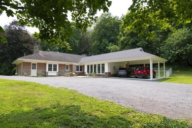 Welcome to this beautifully renovated one-level home, situated - photo 4