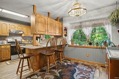 **Lakefront on 3.67 Acres - Hunter Lake!** One-owner home in - photo 9