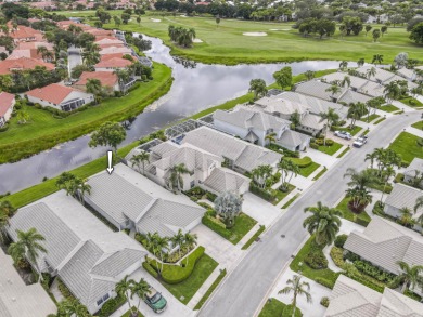 Lake Home For Sale in Palm Beach Gardens, Florida