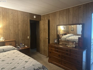 This well-maintained manufactured home is tucked in the hills - photo 11