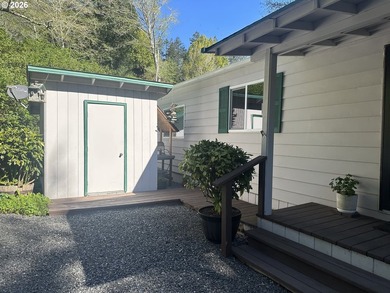 This well-maintained manufactured home is tucked in the hills - photo 22