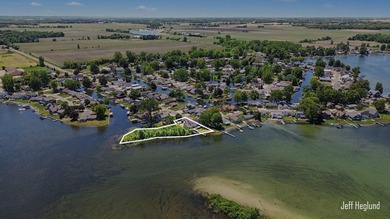 This immaculate, custom-built Gun Lake home is being offered for - photo 2