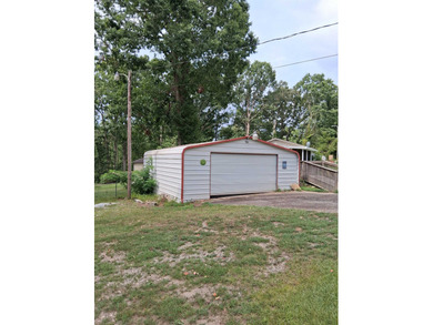 This home offers a cozy cottage feel on the inside, no carpet