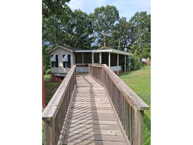 This home offers a cozy cottage feel on the inside, no carpet