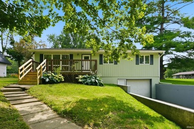 Enjoy everything Lake Wawasee has to offer from this beautifully - photo 1