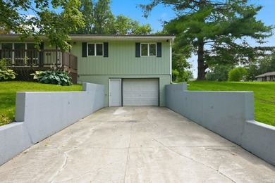 Enjoy everything Lake Wawasee has to offer from this beautifully - photo 3