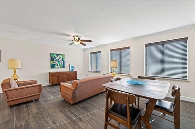 Welcome to this fresh and updated sun-filled condo that captures