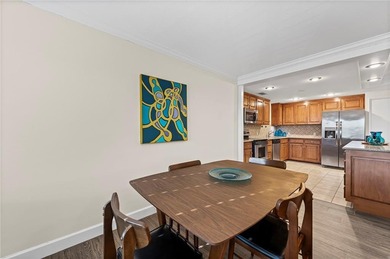 Welcome to this fresh and updated sun-filled condo that captures