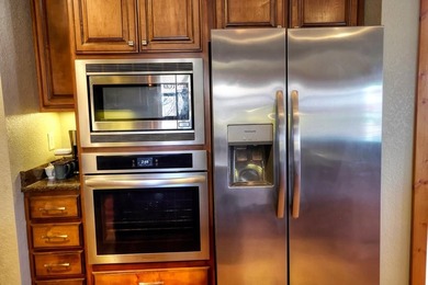 Welcome to Grand View Falls, where this custom-built residence - photo 14