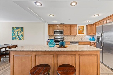 Welcome to this fresh and updated sun-filled condo that captures