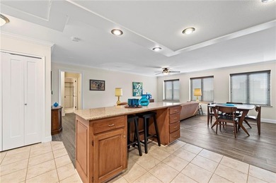 Welcome to this fresh and updated sun-filled condo that captures