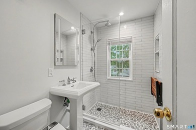 Completely renovated and move-in ready, this stylish two-level - photo 18