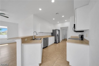 Rare in NE Cape Coral-this spacious corner-lot home offers city - photo 8