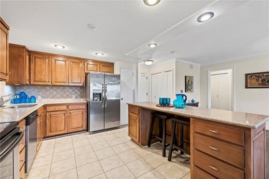 Welcome to this fresh and updated sun-filled condo that captures