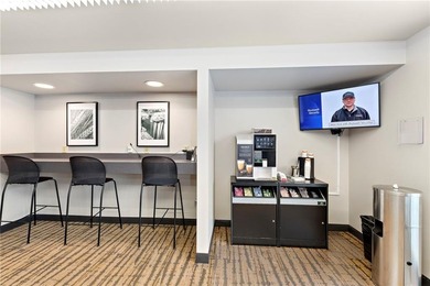 Welcome to this fresh and updated sun-filled condo that captures